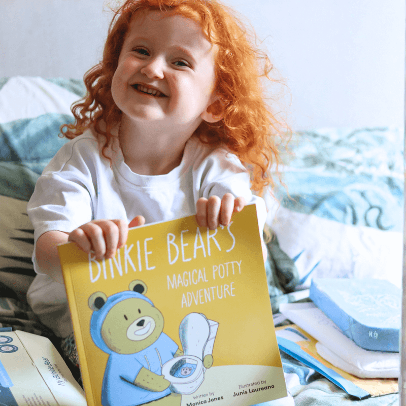 A child reading the Go Time–Potty Time storybook